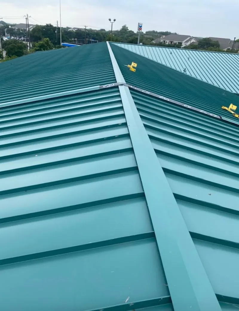 Green commercial metal roof ridge and valley for Metal Roof Repair in Keller